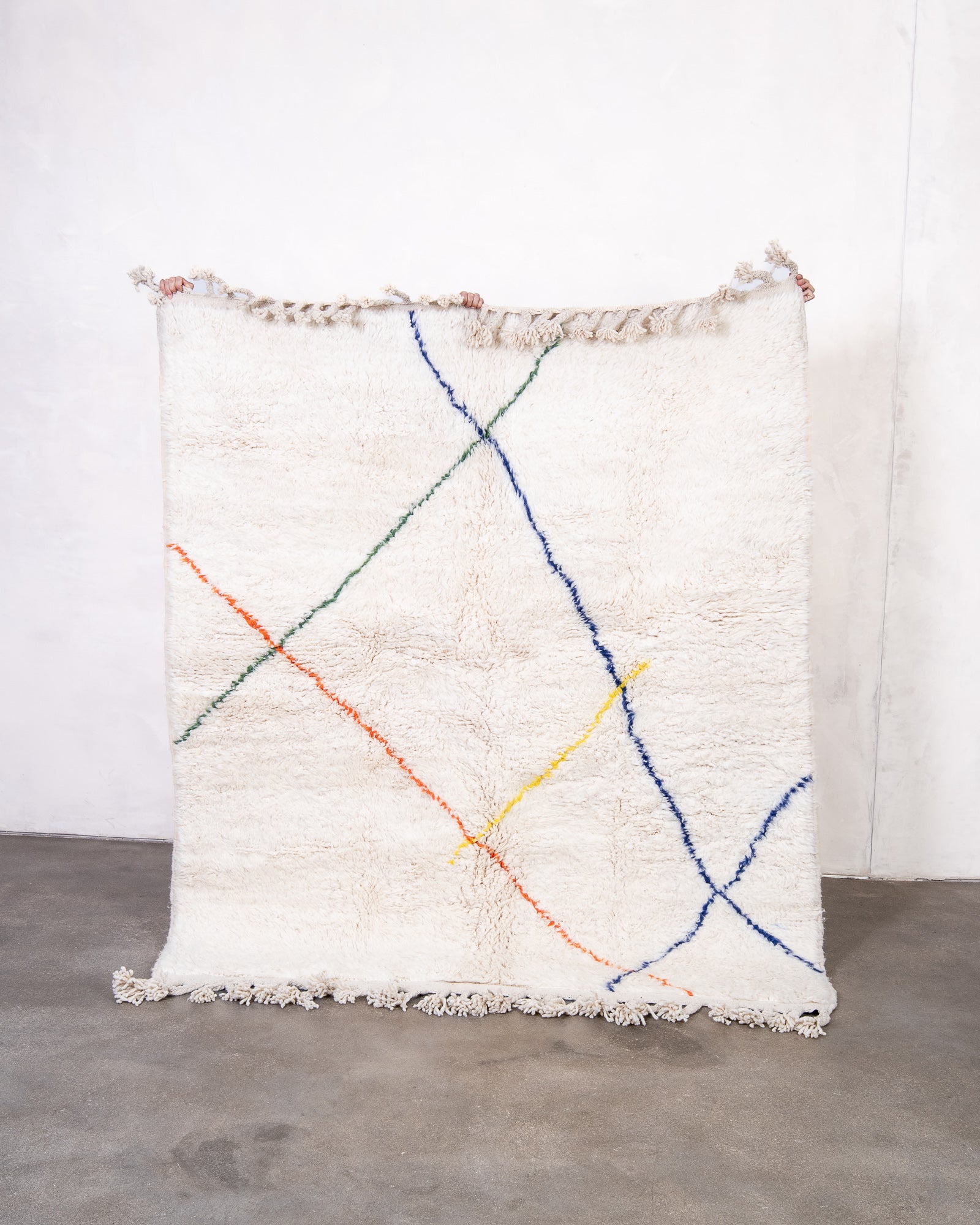 Modern, designer, handcrafted Berber rug from Morocco. Beniourain carpet with beautiful colours and patterns and fluffy wool texture.